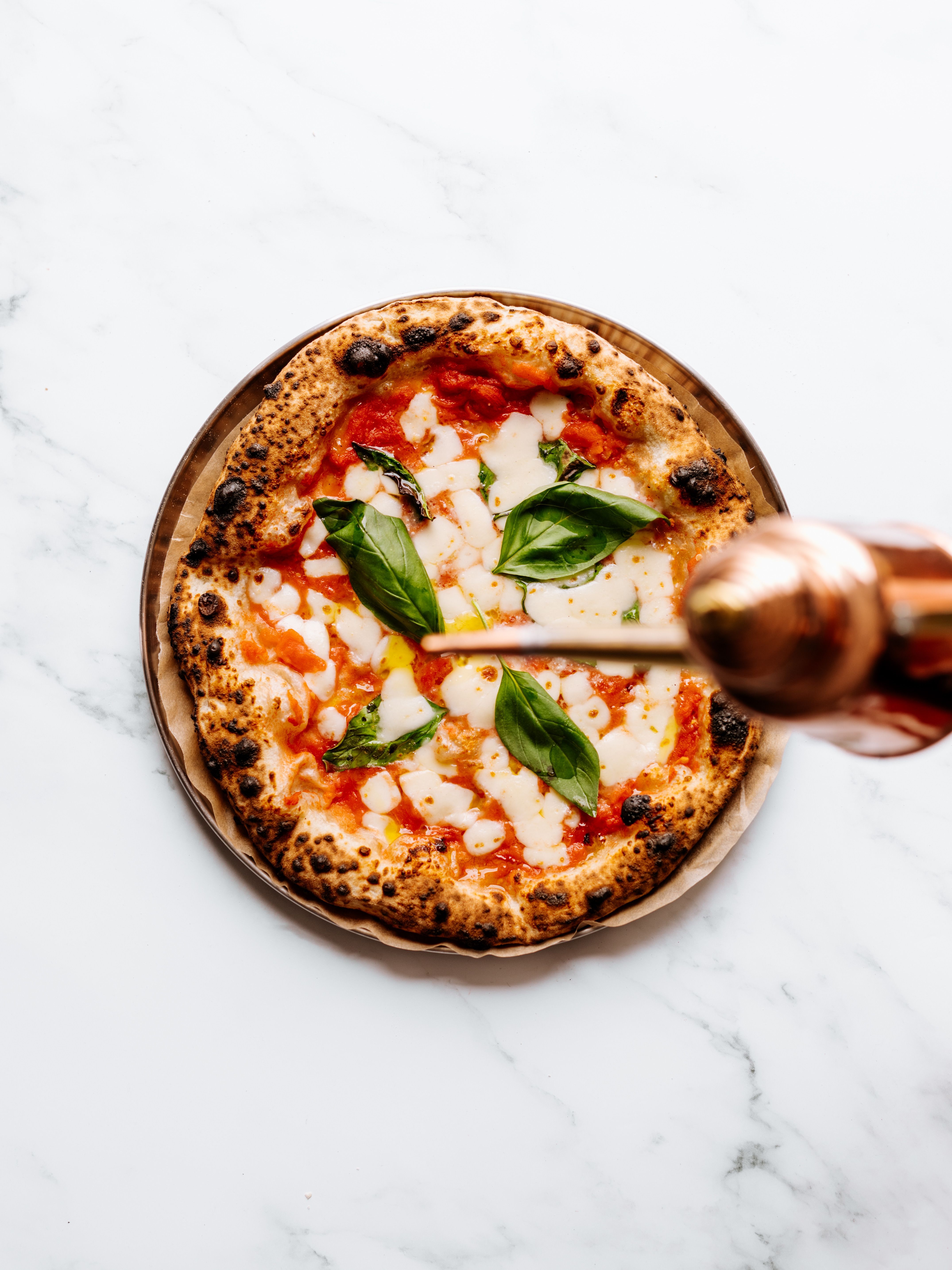 Ein Stück Luppo Spezial Pizza
